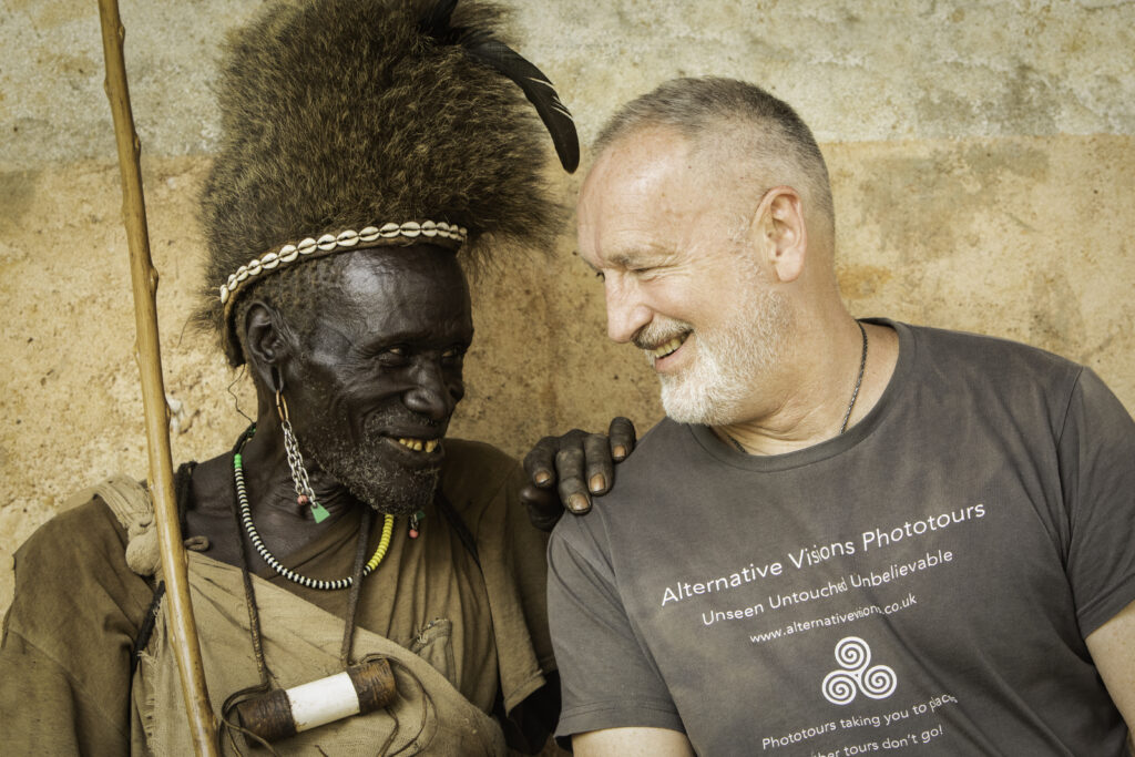 Photographer Trevor Cole with the leader of an Ethiopian tribe.